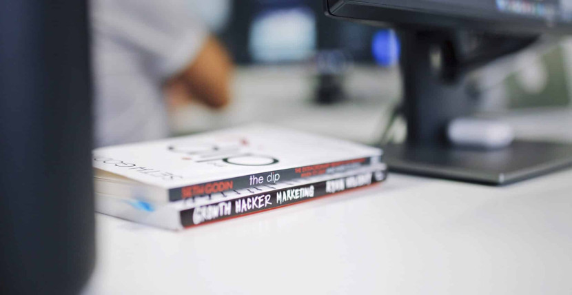 Two books on a table.