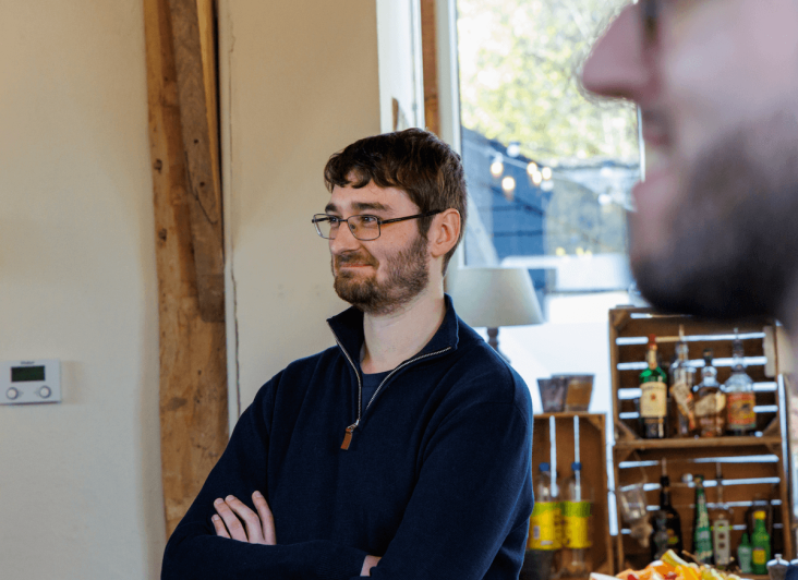 James crossing his arms