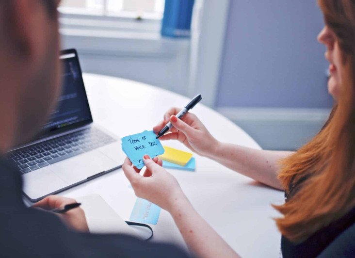 Woman holding a note