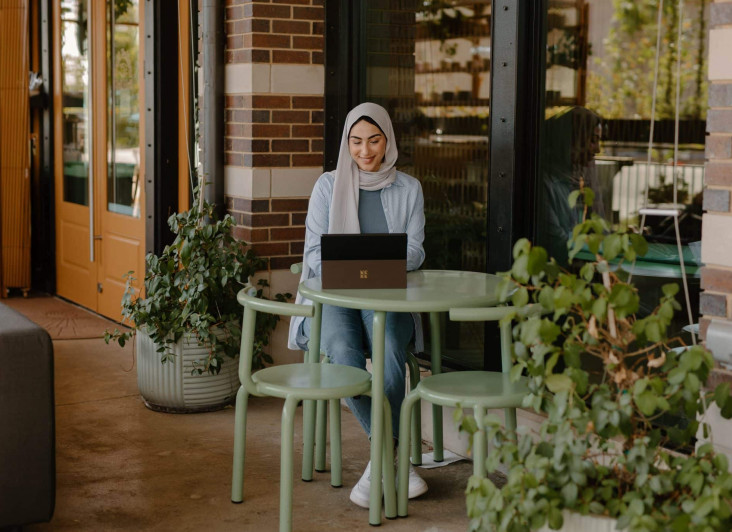 Woman using a Microsoft surface tablet.