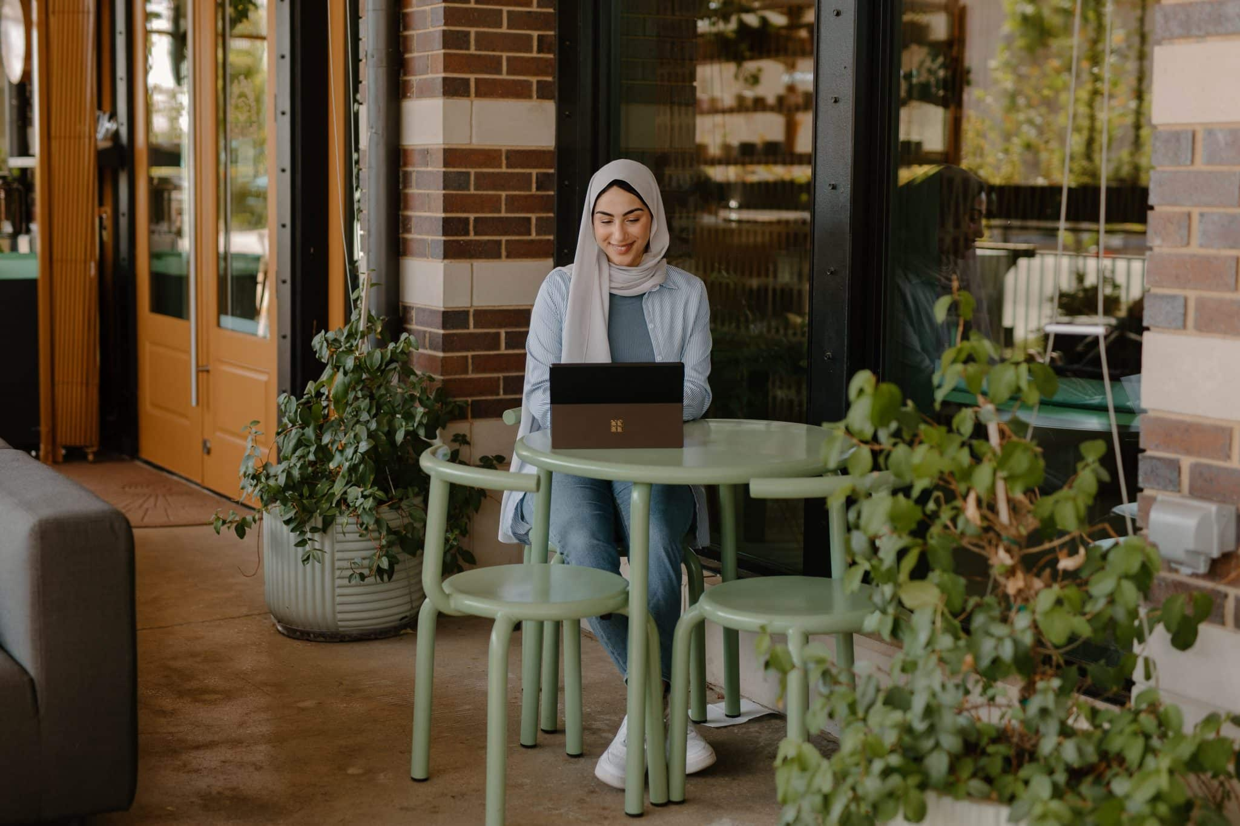 Woman using a Microsoft surface tablet.